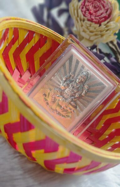 Lakshmi Coin in Traditional Bamboo Basket
